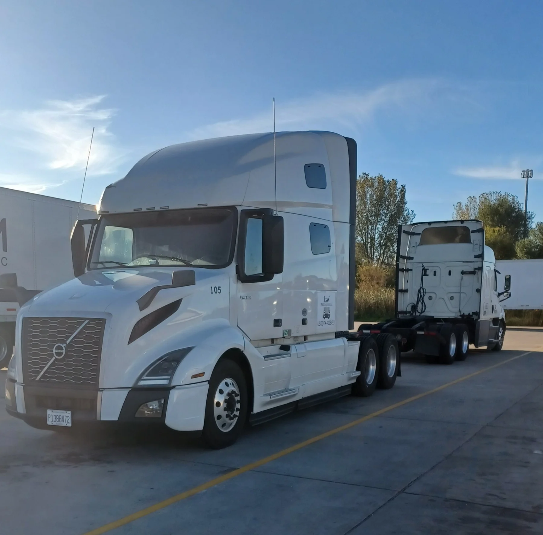 P&G Logistics white Volvo tractor
