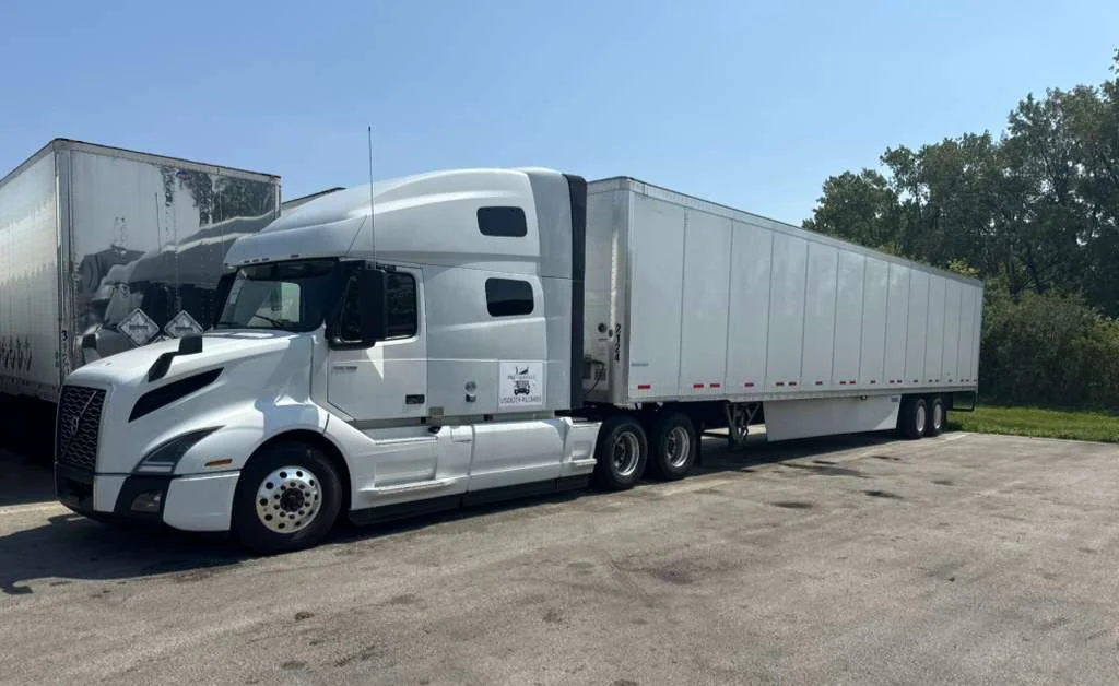 P&G Logistics tractor and dry van trailer